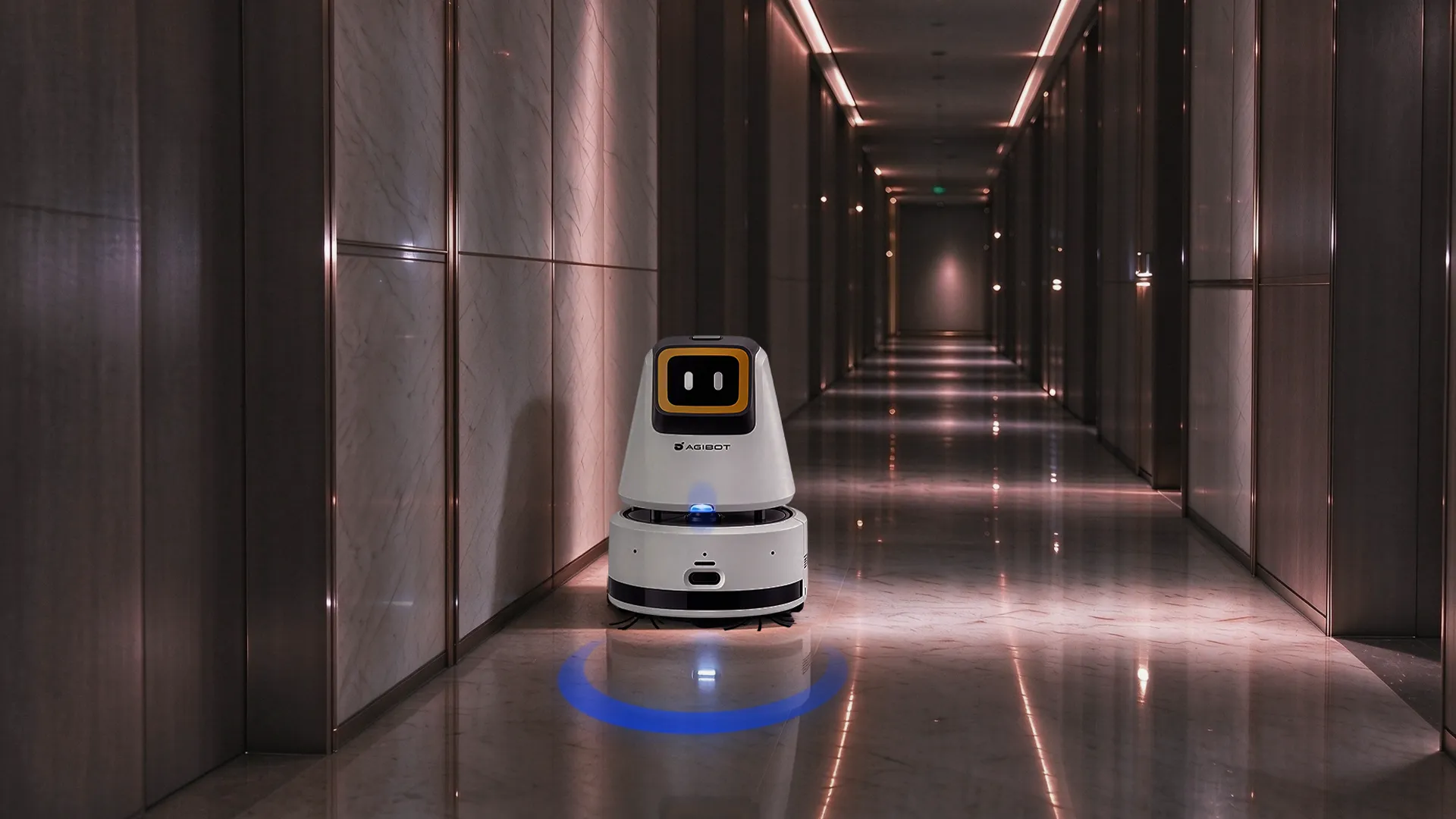 C2P mopping a hotel corridor at night