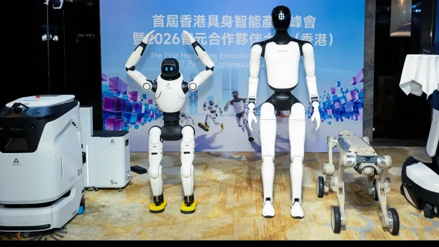 C4 and C5 cleaning robots on stage with AGIBOT humanoid robots at the first Hong Kong Embodied AI Industry Summit
