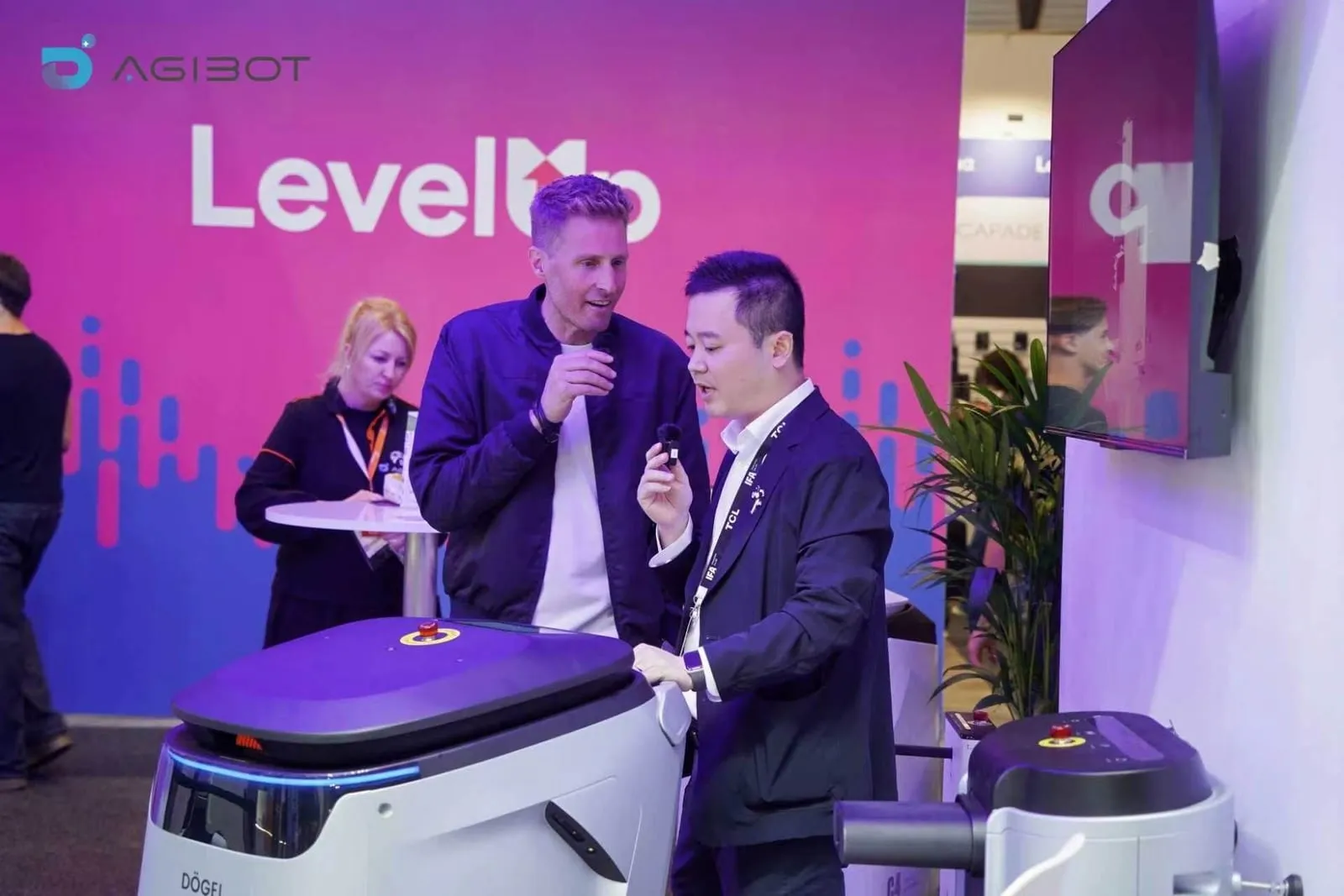 A cleaning robot demonstrated to visitors at the AGIBOT stand